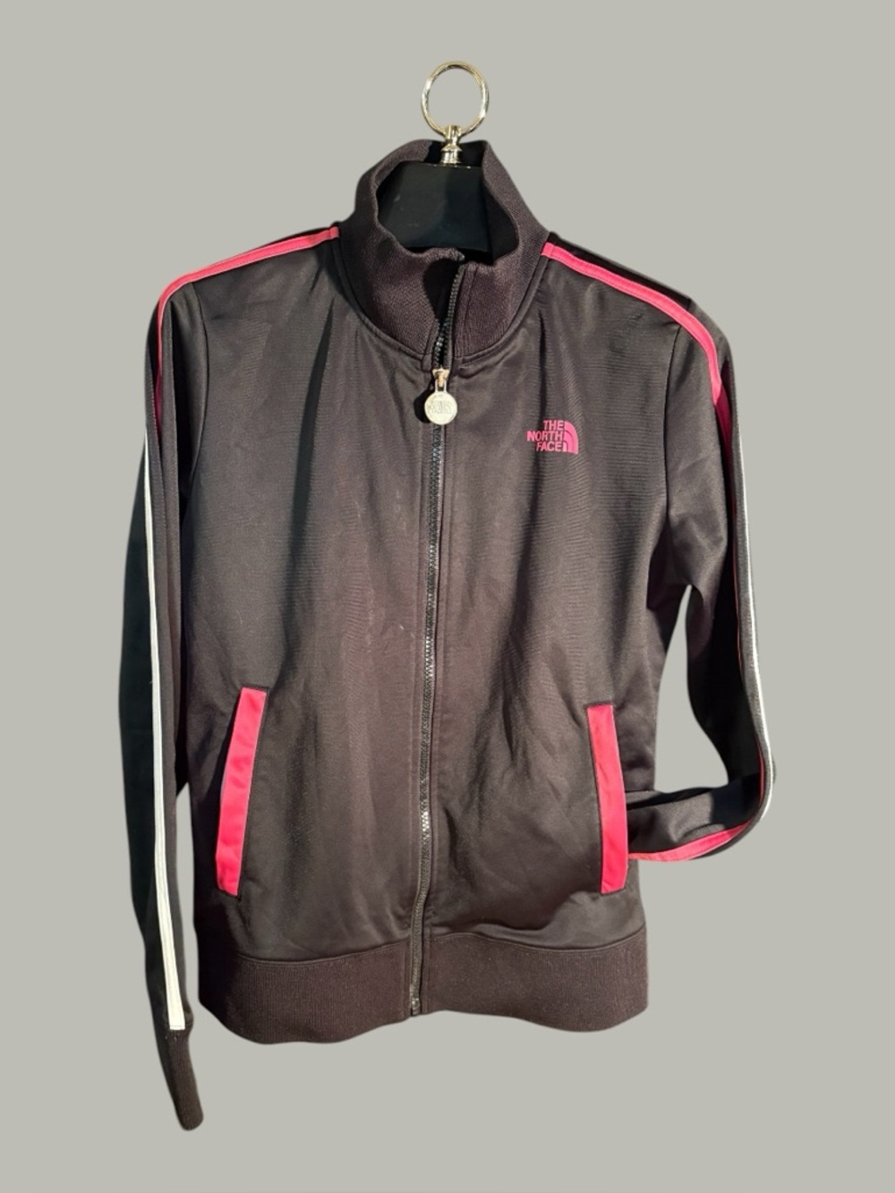 North Face Black Bomber Jacket with Pink and White Accents zip pockets and front